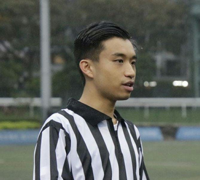 Chris Lau in a referee shirt