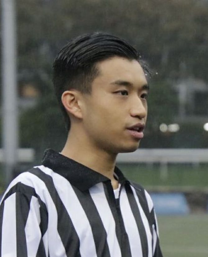Chris Lau in a referee shirt